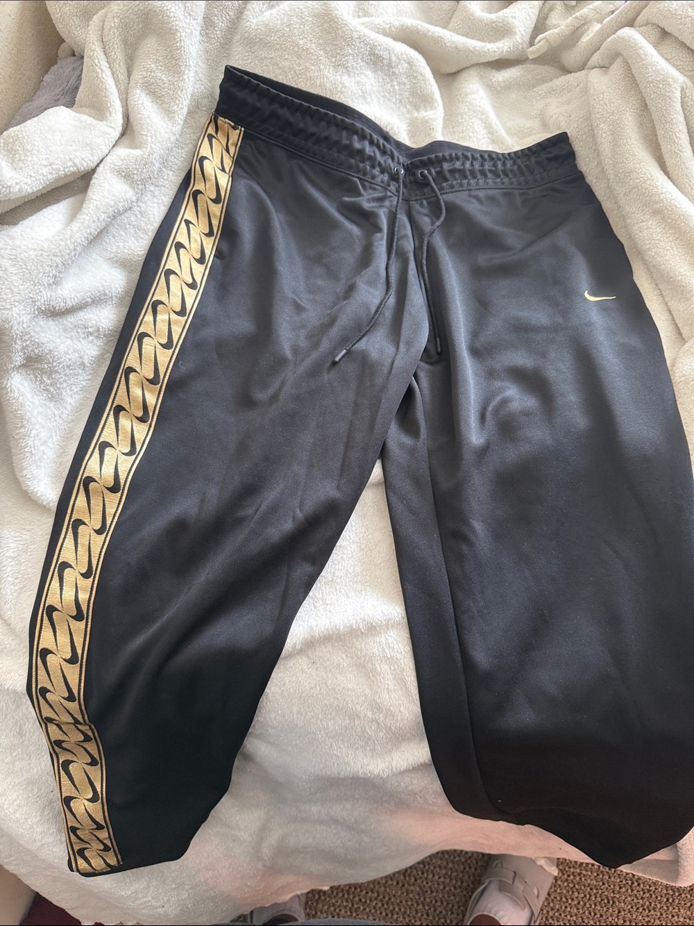 Nike Black Track Pants with Gold Side Pattern